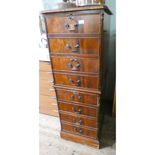 154 - A reproduction mahogany chest of drawers style four drawer filing cabinet