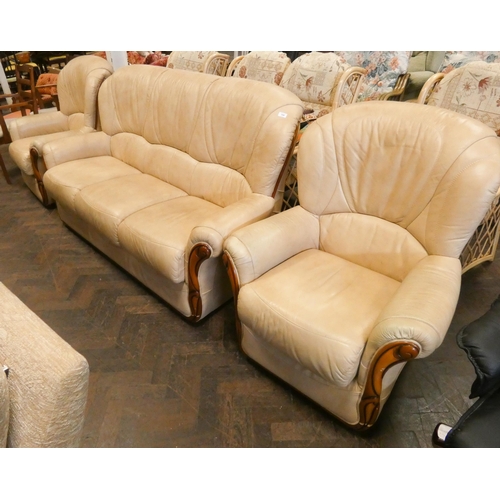 190 - A three seater settee three piece lounge suite in beige leather