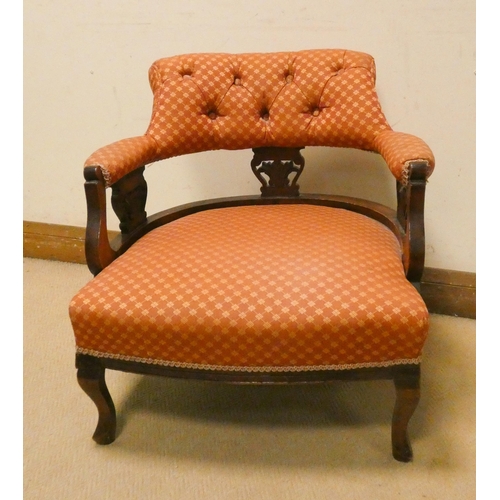 192 - An Edwardian walnut framed tub shaped upholstered elbow chair