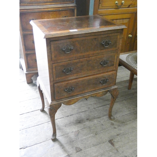 2 - A Georgian style figured walnut and cross banded small chest fitted three drawers on cabriole legs, ... 