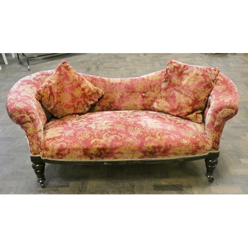 200 - A late Victorian Chesterfield style settee in red and patterned covering with two loose cushions