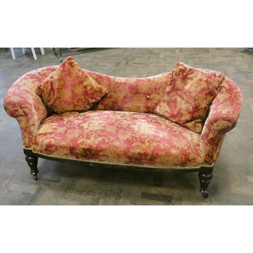 200 - A late Victorian Chesterfield style settee in red and patterned covering with two loose cushions