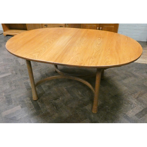 236 - A modern Ercol light elm oval extending dining table with fold away centre leaf, 64