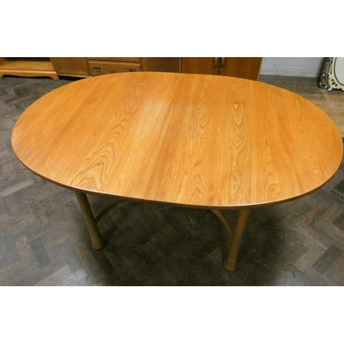 236 - A modern Ercol light elm oval extending dining table with fold away centre leaf, 64