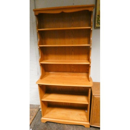 239 - A modern Ercol pale elm open bookcase or dresser fitted with shelves, 3' wide