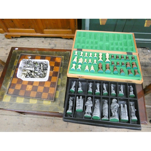 26 - Three assorted chess sets with chess boards