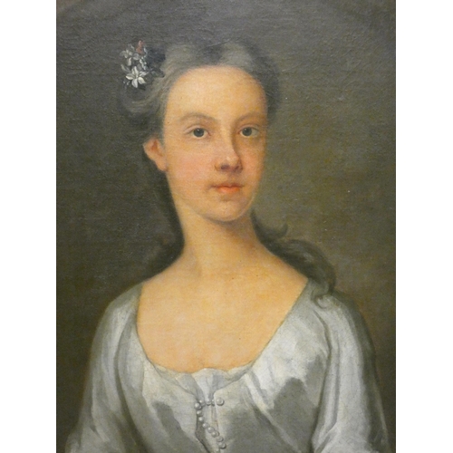 280 - Oil on canvas English school half-length portrait of a Georgian lady with flowers in her hair in a l... 