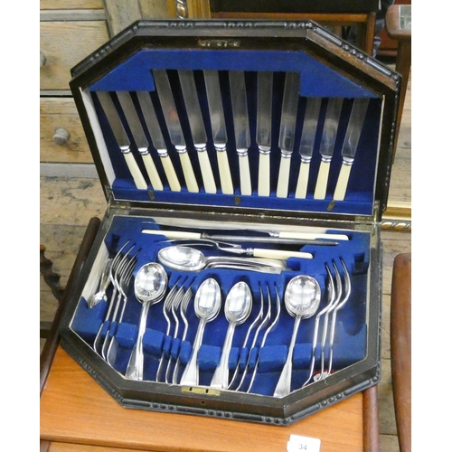 33 - Canteen of cutlery in oak case