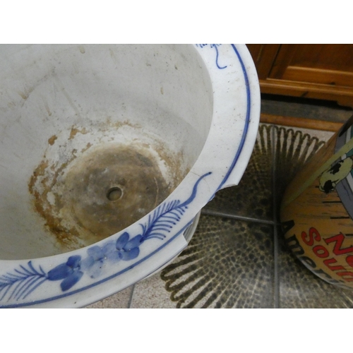 4 - Two Chinese style blue and white china jardinières with saucers (one damaged)