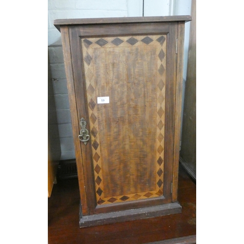 59 - An Edwardian bedside cabinet with marquetry style panelled door