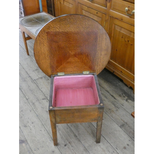 7 - A circular oak coffee table/work box