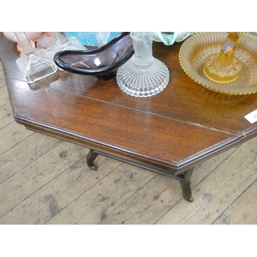 70 - A large Edwardian octagonal two tier walnut occasional table