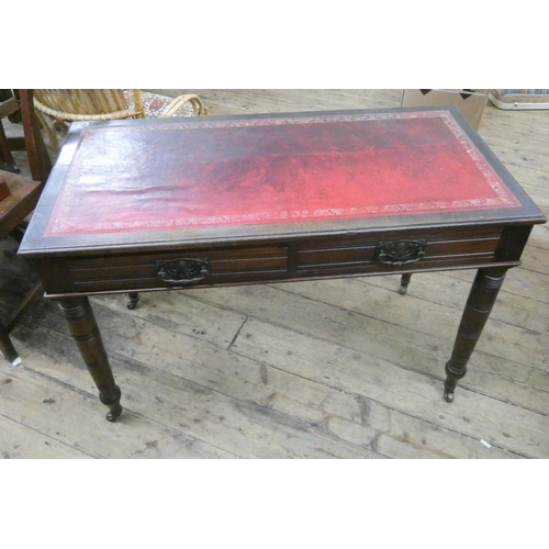 81 - An Edwardian mahogany writing table with inset red leather top, fitted with two drawers, 3'9 wide