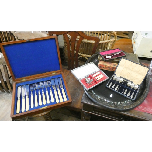 82 - Various cases of assorted cutlery and oval black lacquered tray