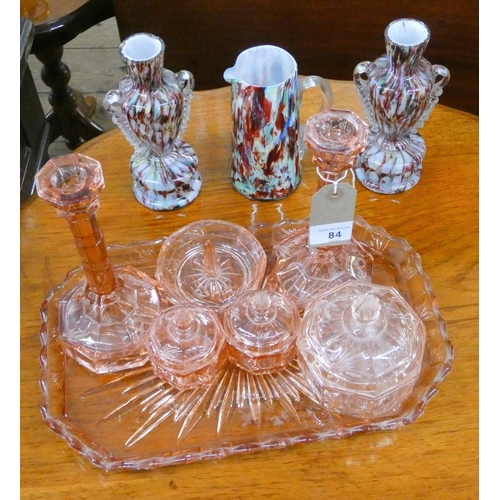 84 - A pink glass dressing table set, pair of decorative coloured vases and a similar jug