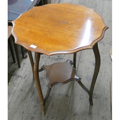 85 - A two tier circular Edwardian mahogany occasional table