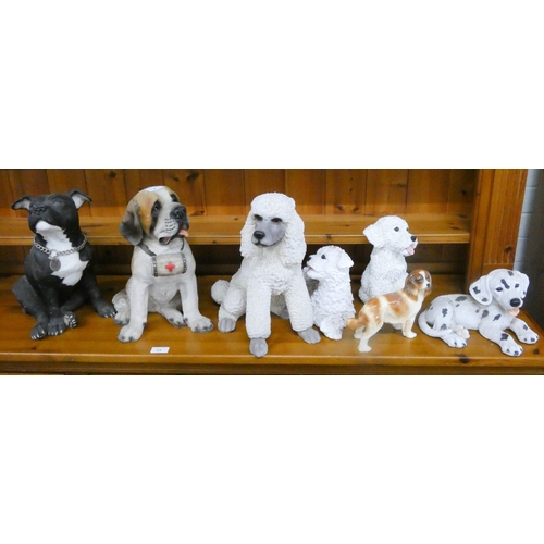 9 - Seven assorted dog ornaments