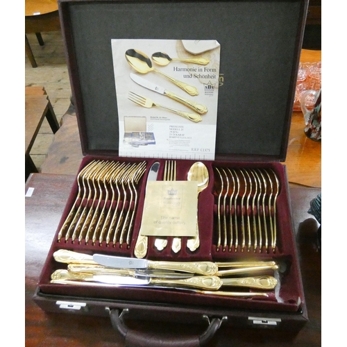 91 - A set of German gold plated cutlery in case