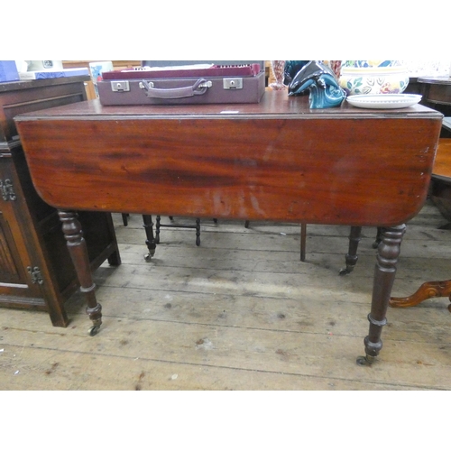 95 - A Victorian mahogany Pembroke table, fitted drawer on turned legs, 3'3 wide