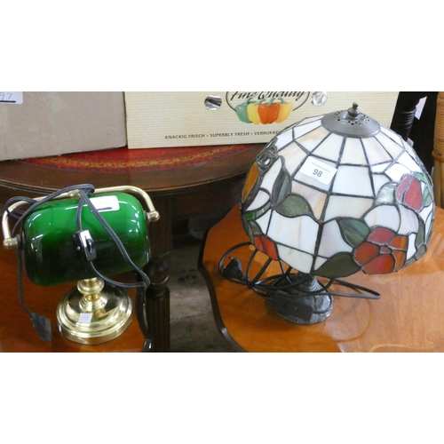 98 - A Tiffany style electric table lamp and a small brass and glass bankers lamp