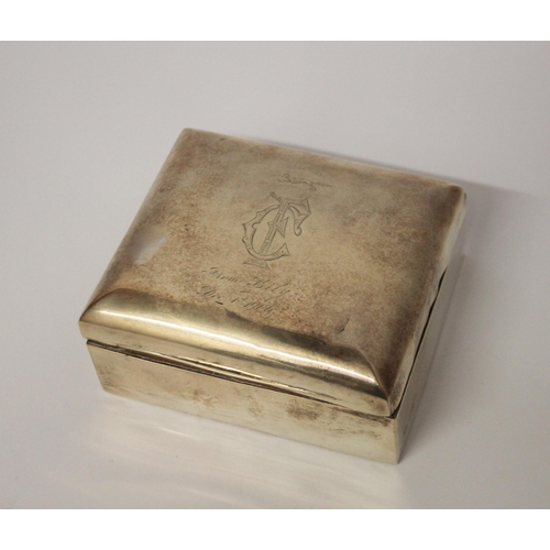 542 - An Edwardian  small silver cigarette box, 9.5 cms across