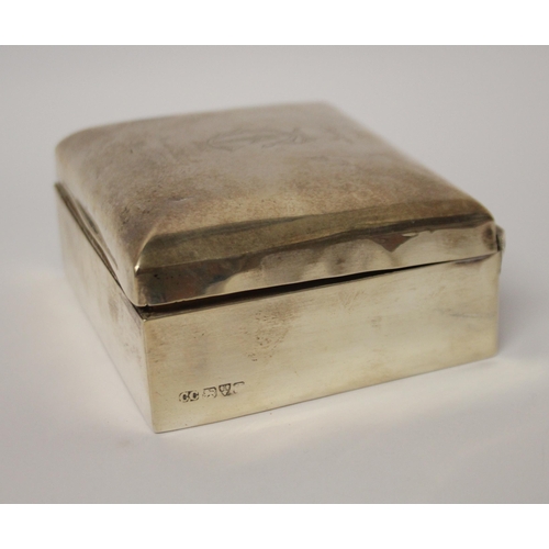 542 - An Edwardian  small silver cigarette box, 9.5 cms across