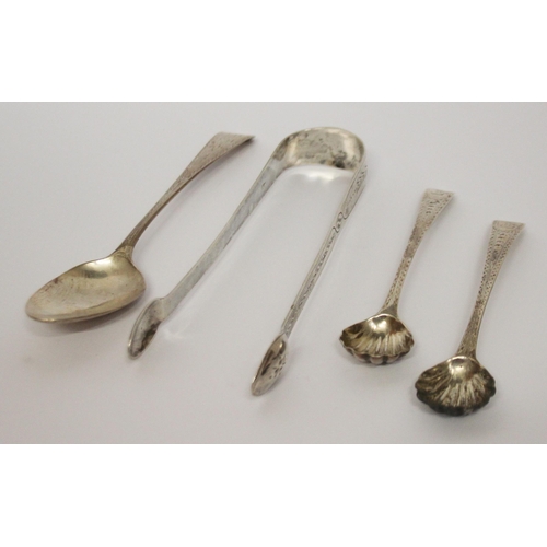 548 - Georgian silver -  sugar nips, pair of salt spoons and a teaspoon all with bright cut engraving.