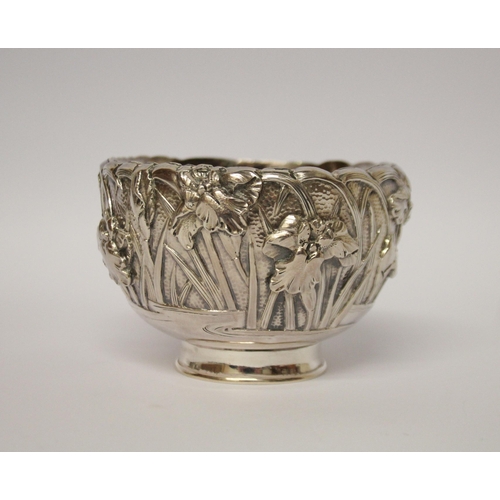 555 - A Japanese silver sugar basin, the exterior cast with iris, gilded interior. Character marks to base... 