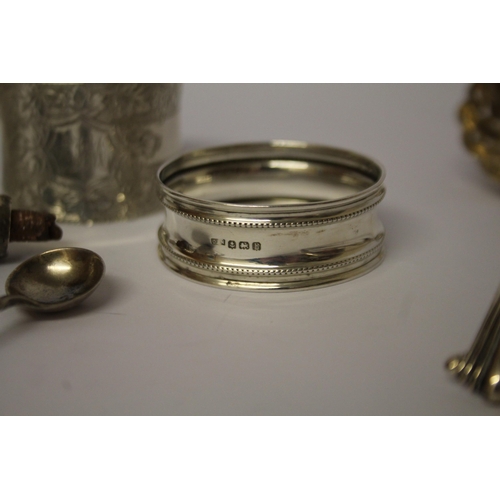 559 - A collection of small silver ware - napkin rings, sifting spoons, salt spoons etc