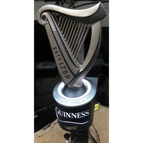 285 - A large illuminated Guinness advertising bar mounted ornament