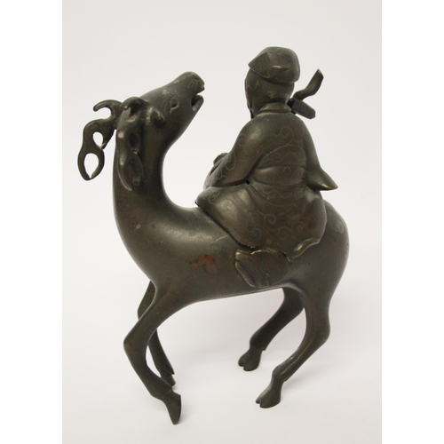 320 - A Chinese bronze figure of a sage astride an antelope, 7