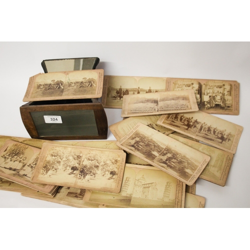 324 - A Victorian walnut stereoscope and Boer War viewing cards