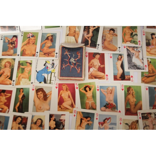 326 - A set of risqué 1950's vintage playing cards