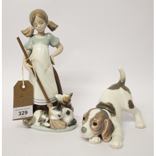 329 - Lladro figurine of a girl playing with kittens and a puppy with a ball