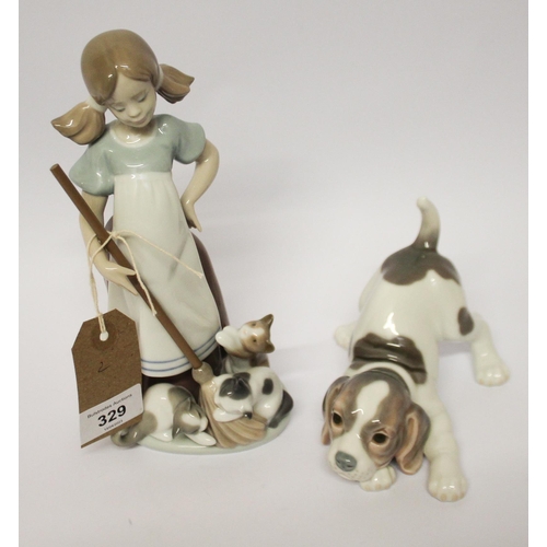 329 - Lladro figurine of a girl playing with kittens and a puppy with a ball