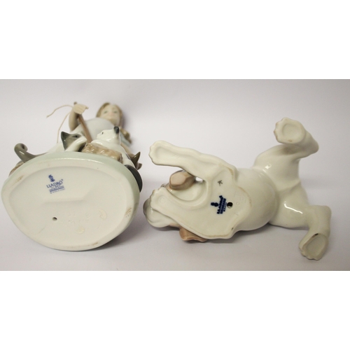 329 - Lladro figurine of a girl playing with kittens and a puppy with a ball