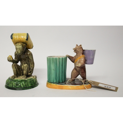 342 - Two pieces of Victorian Majolica - bear shaped match striker and a monkey figure