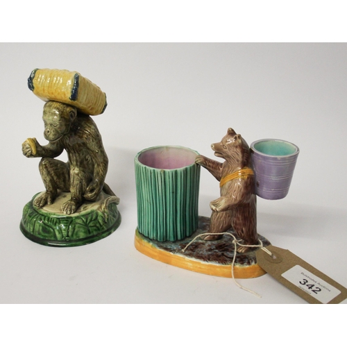 342 - Two pieces of Victorian Majolica - bear shaped match striker and a monkey figure