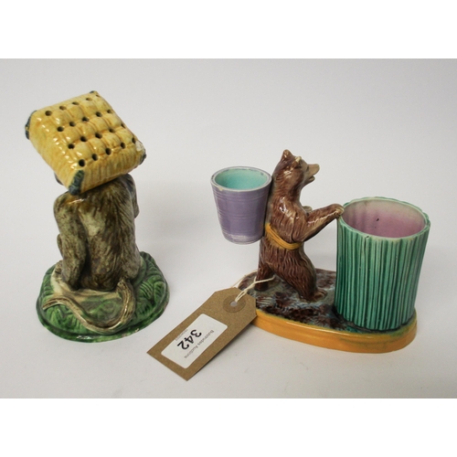 342 - Two pieces of Victorian Majolica - bear shaped match striker and a monkey figure