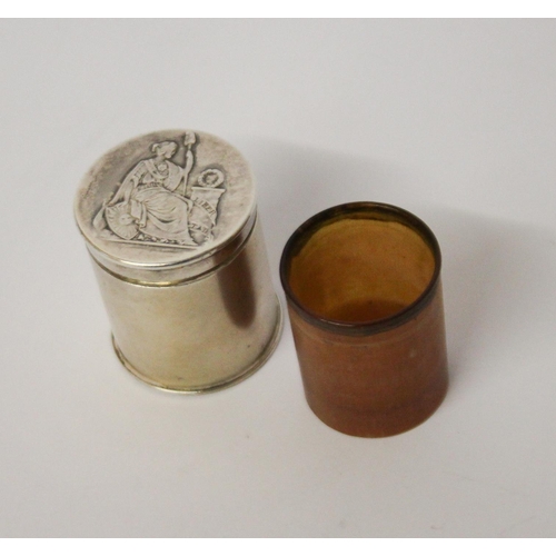 515 - An Eastern silver cylindrical box, with liner, coin set to lid, character seal marks to base 3.5 cms... 