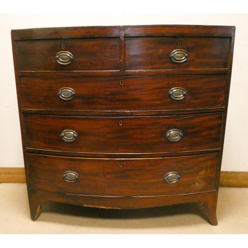 404 - A Georgian mahogany bow front chest of three long and two short drawers with brass handles, standing... 