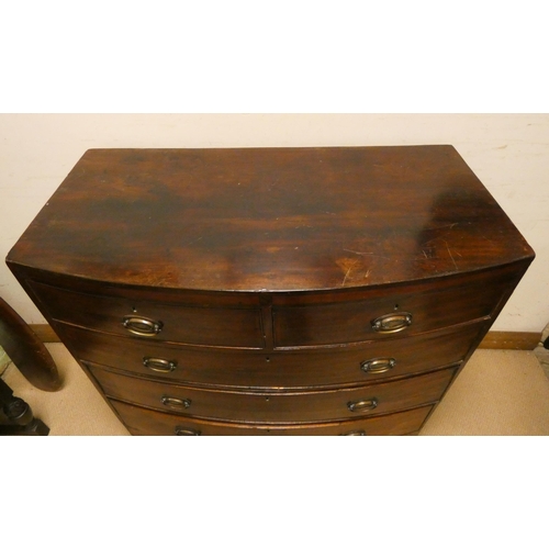 404 - A Georgian mahogany bow front chest of three long and two short drawers with brass handles, standing... 