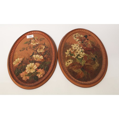 347 - Pair of Watcombe Torquay terracotta oval panels, painted with British flowers