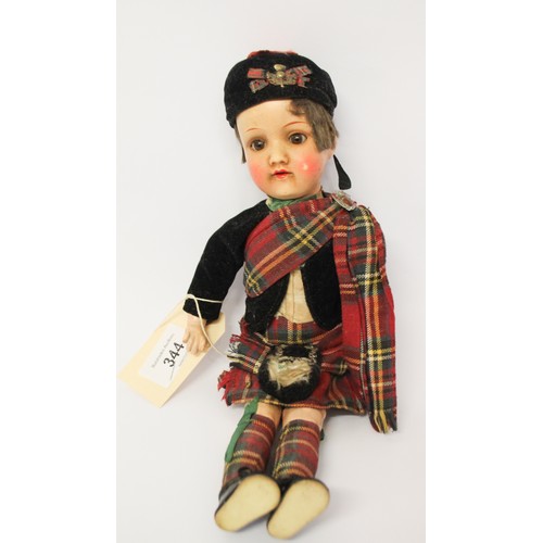 344 - Armand Marseille bisque headed Scottish dressed boy doll, jointed composition body