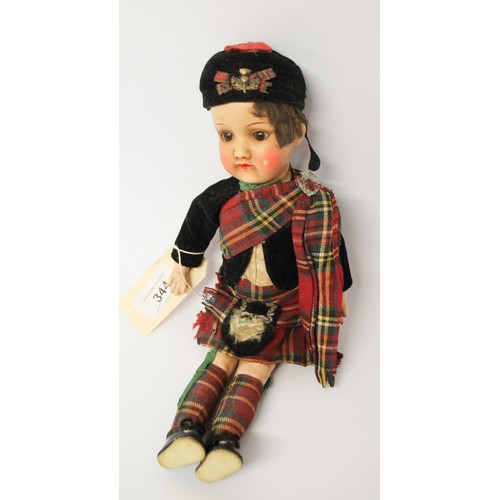 344 - Armand Marseille bisque headed Scottish dressed boy doll, jointed composition body