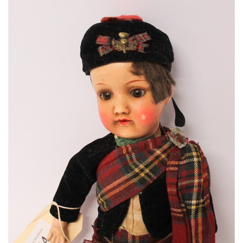 344 - Armand Marseille bisque headed Scottish dressed boy doll, jointed composition body