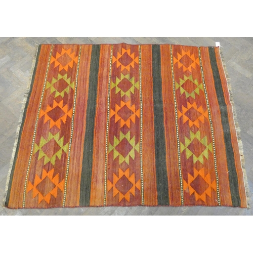 470 - An orange and patterned wool pile Kilim rug 5'6 x 4'6