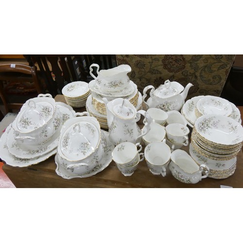 156A - A collection of approximately 102 pieces of Royal Albert Haworth pattern dinner and tea ware