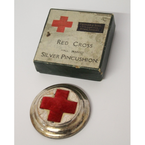 517 - A hallmarked silver Red Cross Pin Cushion, in original box