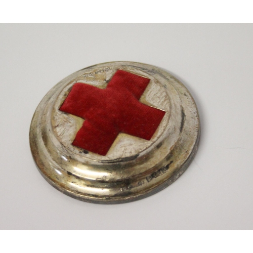 517 - A hallmarked silver Red Cross Pin Cushion, in original box